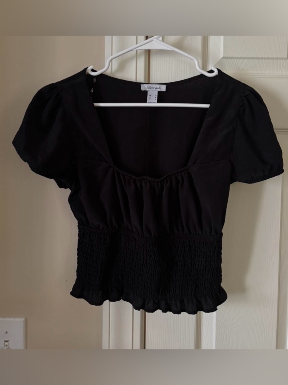 Revamped Black Short Sleeve Smocked Peplum Top